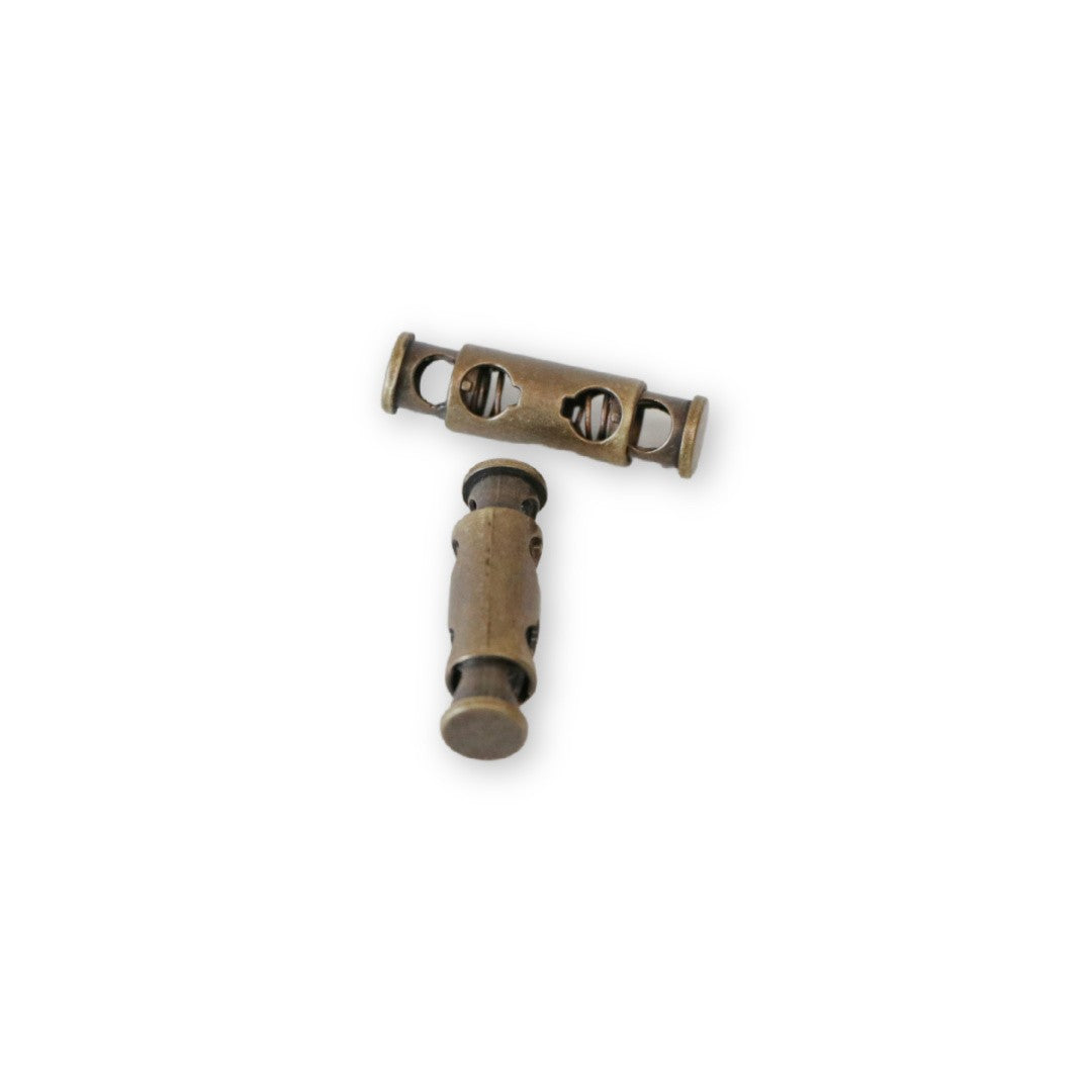 Two Cord Stoppers 1/8in Antique
